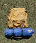 with Alpine Designs Plastic External Frame pack